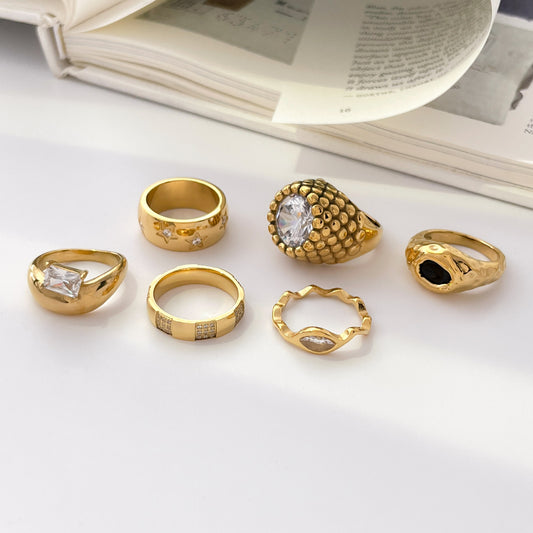 Floral Core Zircon Ring, Black Zircon Eye, Wave-Patterned Star Ti Steel, 18K Gold-Plated