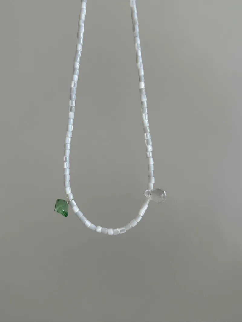 Elegant Pearl Bead Necklace with Distinctive Green Charm - Fashionable Accessory for All Occasions