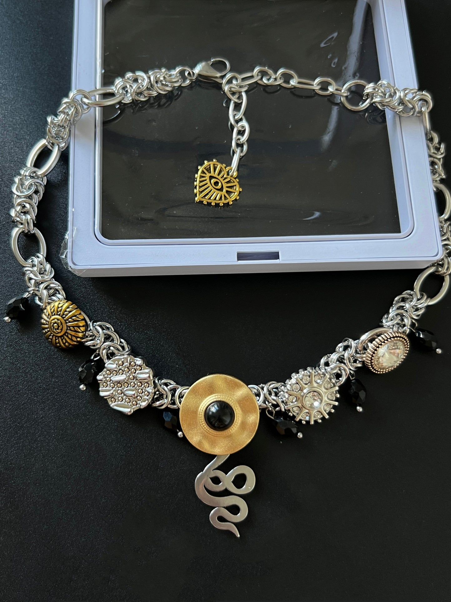 Vintage snake-shaped pendant silver necklace with whimsical button pendants, Y2K cyberpunk style, suitable for both men and women