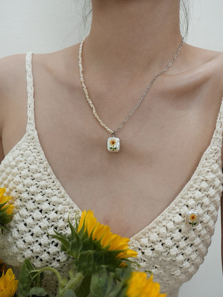 Sunflower Pearl Pendant, featuring pearls set in 18K gold-plated and terling silver chain, complemented by Sunflower Pearl Earrings.