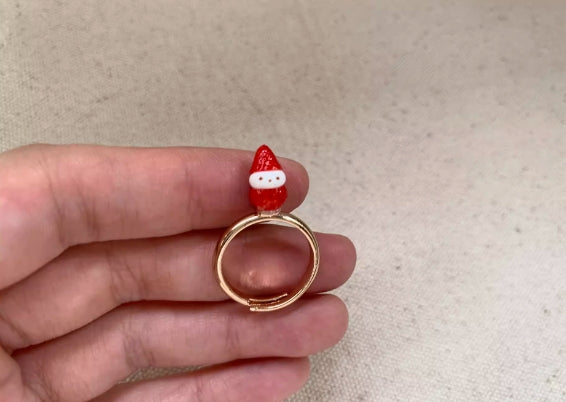 A Christmas snowman strawberry cream shaped golden ring,"An interesting design, a special gift."