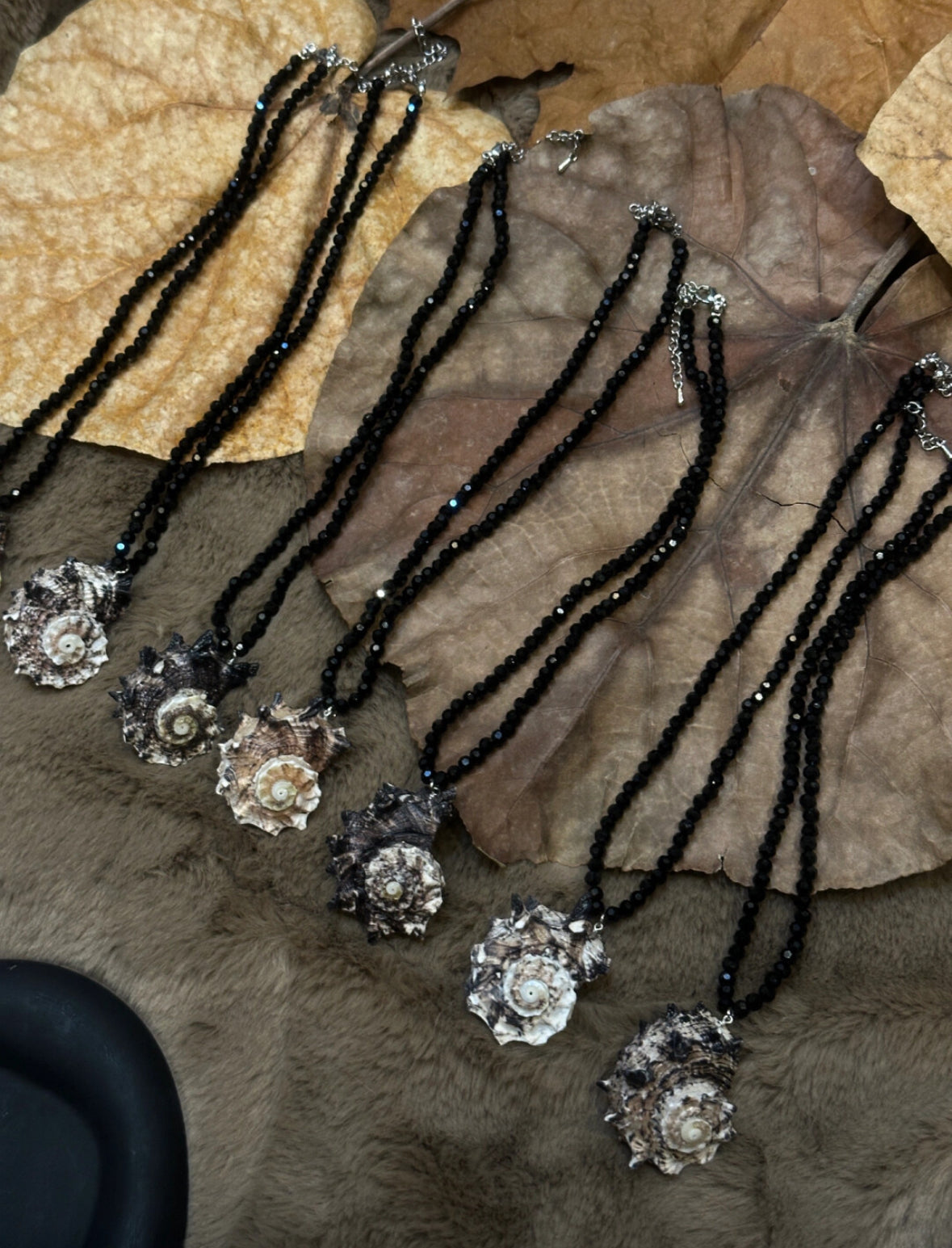 Handmade natural conch necklace with black beaded necklace, featuring marine elements, a unique and perfect handcrafted gift.