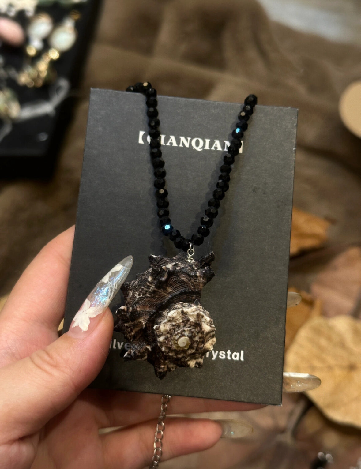 Handmade natural conch necklace with black beaded necklace, featuring marine elements, a unique and perfect handcrafted gift.