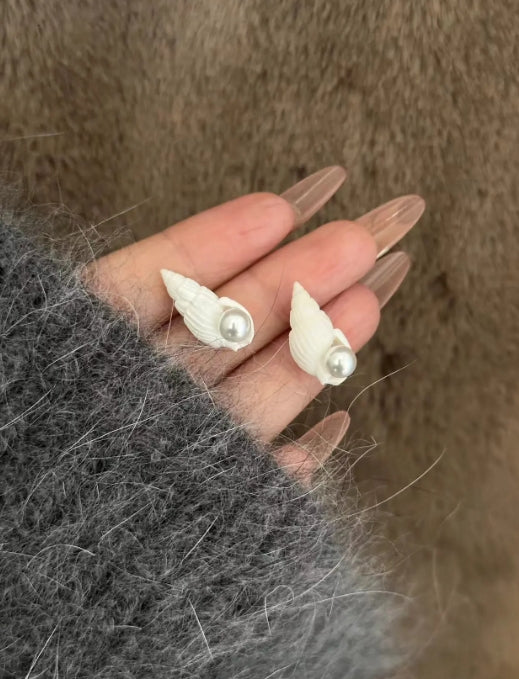 Handcrafted,white conch shell earrings, pearl s925 silver studs,natural conch shell, simple and elegant design, a perfect and unique gift.  View on Etsy Copy   Active Listed on Jul 26, 2024