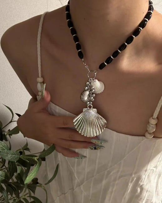 Handcrafted,silver shell pendant necklace with black beaded necklace, adorned with shell and conch decorations,unique ocean style.nice gift.