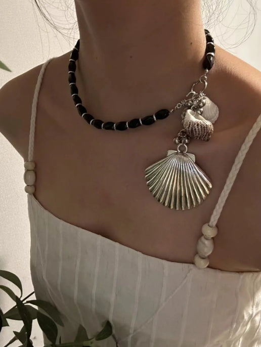 Handcrafted,silver shell pendant necklace with black beaded necklace, adorned with shell and conch decorations,unique ocean style.nice gift.