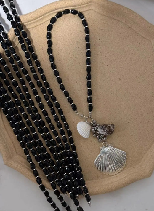Handcrafted,silver shell pendant necklace with black beaded necklace, adorned with shell and conch decorations,unique ocean style.nice gift.