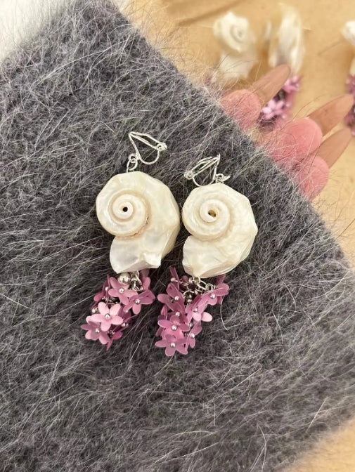 Handcrafted, white natural conch shells earrings, accented with purple floral details,S925,showcasing a distinct oceanic style,a perfectgift
