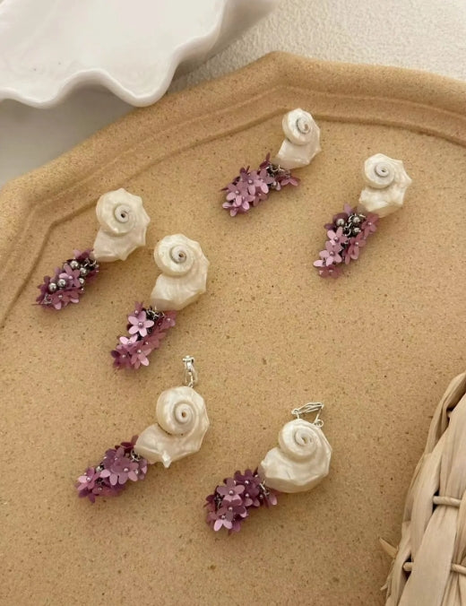 Handcrafted, white natural conch shells earrings, accented with purple floral details,S925,showcasing a distinct oceanic style,a perfectgift