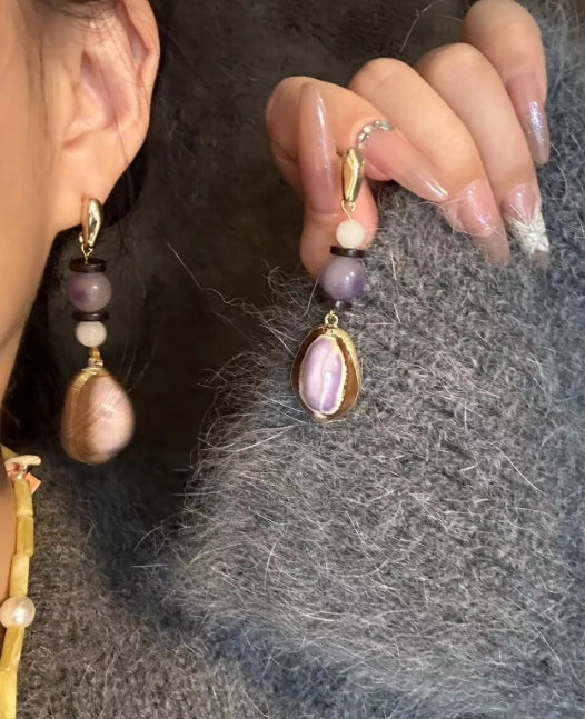 Handcrafted earrings made with natural conch shells and adorned with purple jade beads, S925silver,elegant and refined design,a perfect gift