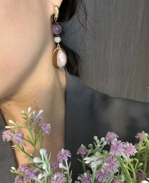 Handcrafted earrings made with natural conch shells and adorned with purple jade beads, S925silver,elegant and refined design,a perfect gift