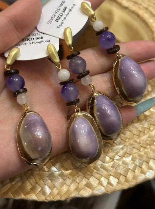 Handcrafted earrings made with natural conch shells and adorned with purple jade beads, S925silver,elegant and refined design,a perfect gift