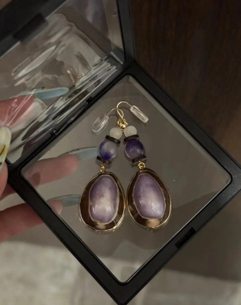 Handcrafted earrings made with natural conch shells and adorned with purple jade beads, S925silver,elegant and refined design,a perfect gift