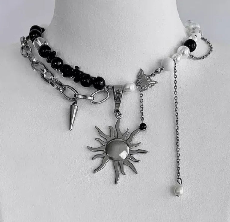 Cyberpunk-inspired sun pendant necklace, accented with obsidian and pearls on a double-layer chain, Y2K choker. It's a perfect gift