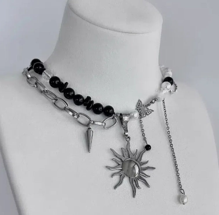 Cyberpunk-inspired sun pendant necklace, accented with obsidian and pearls on a double-layer chain, Y2K choker. It's a perfect gift