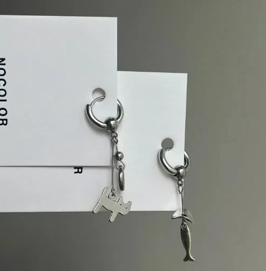 Handcrafted pair of earrings featuring kitten and fish pendants,designed with silver-tone metal, playful and fun design,a perfect gift.