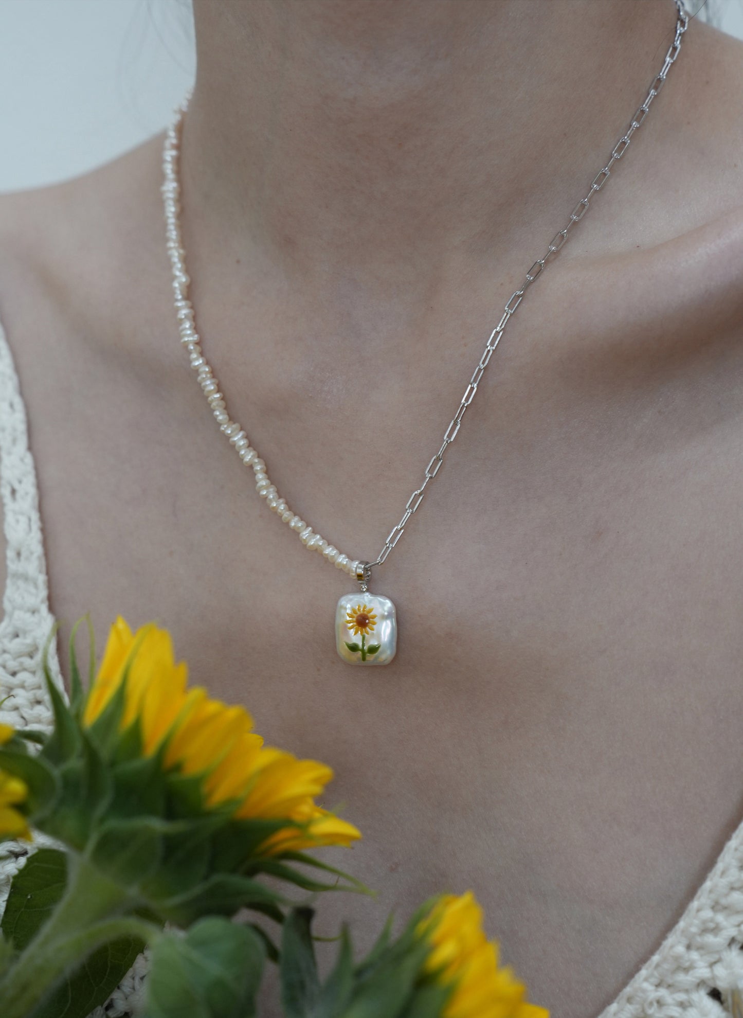 Sunflower Pearl Pendant, featuring pearls set in 18K gold-plated and terling silver chain, complemented by Sunflower Pearl Earrings.