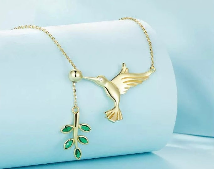 S925 Sterling Silver Hummingbird with Green Diamond Leaf Pendant Necklace, paired with matching ring, a uniquely perfect gift for women.