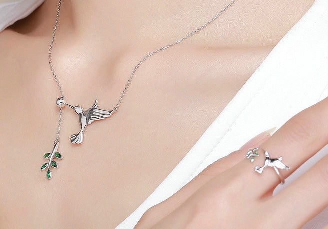 S925 Sterling Silver Hummingbird with Green Diamond Leaf Pendant Necklace, paired with matching ring, a uniquely perfect gift for women.