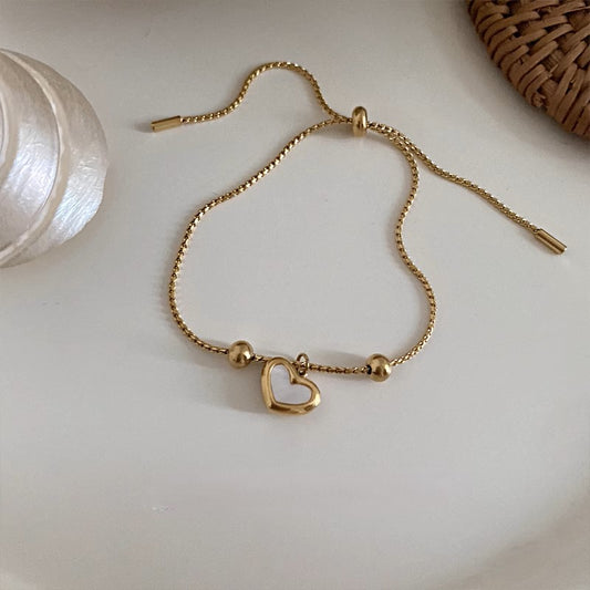 Elegant Natural Mother of Pearl Heart-shaped Drawstring Titanium Steel Golden Bracelet