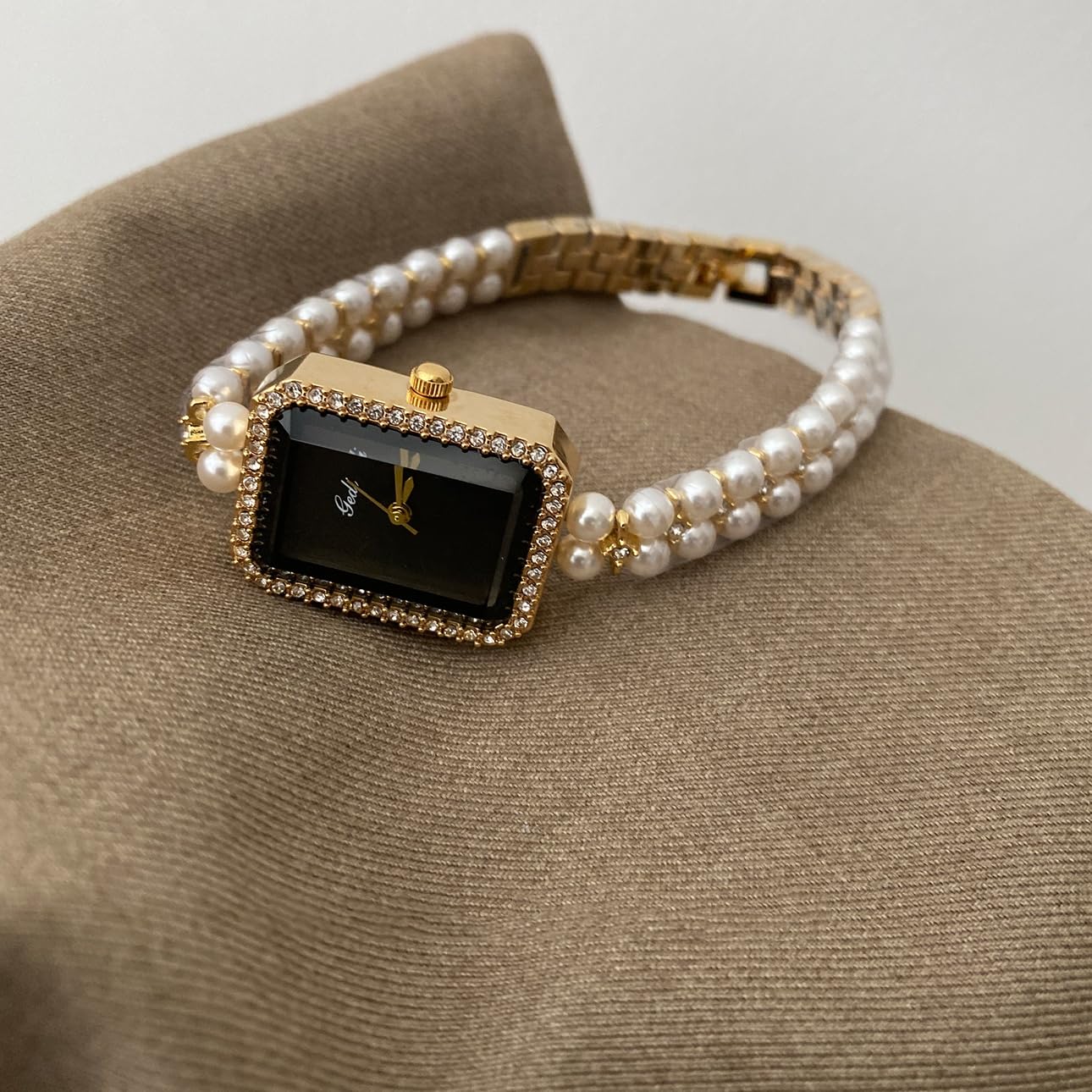 Pearl Strap Black Gold Watch: Square Dial for a Unique, Stylish Women's Timepiece with Sophisticated Appeal