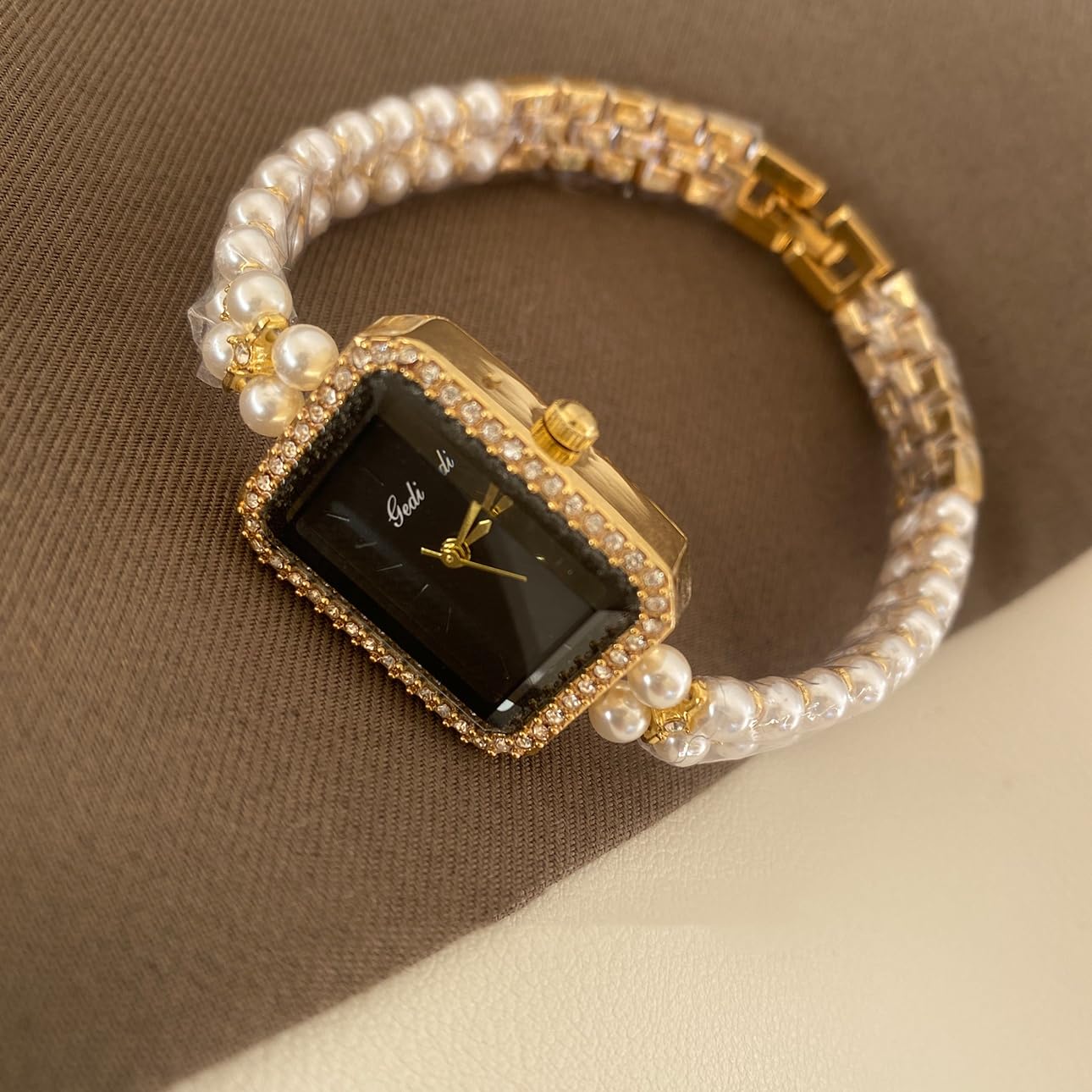 Pearl Strap Black Gold Watch: Square Dial for a Unique, Stylish Women's Timepiece with Sophisticated Appeal