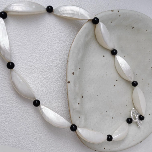 Crescent Moon White and Black Beaded Clavicle Chain Necklace with Statement Design