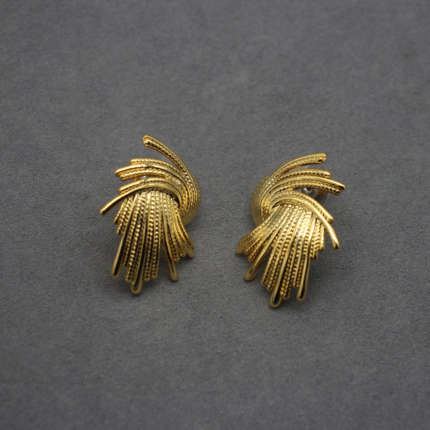 Vintage-chic burst firework design metal earrings, 18K gold-plated, stylishly elegant, uniquely designed for a standout look.