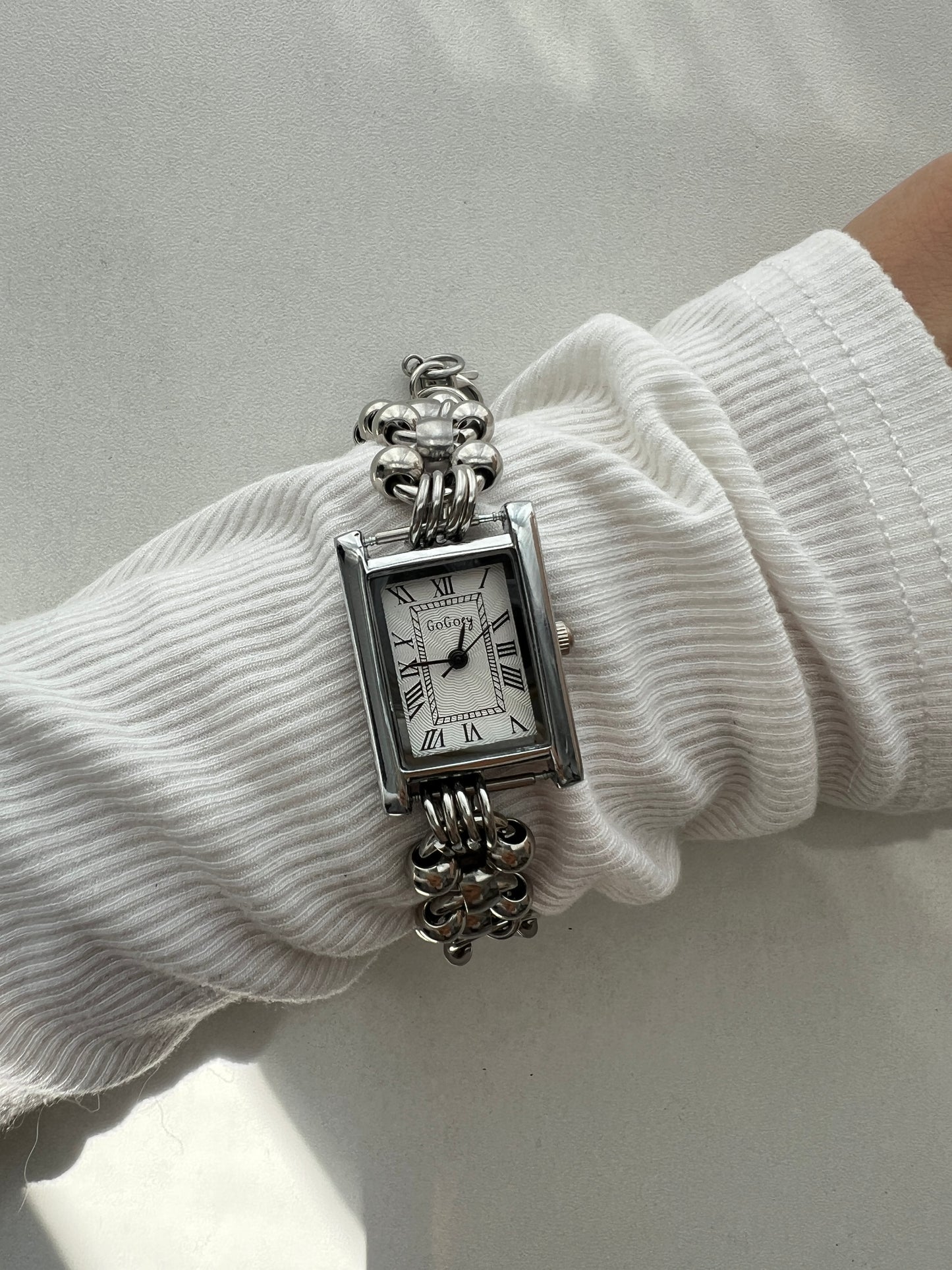 Minimalist silver wrist watch for women
