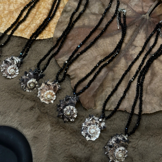 Handmade natural conch necklace with black beaded necklace, featuring marine elements, a unique and perfect handcrafted gift.