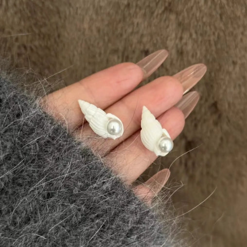 Handcrafted,white conch shell earrings, pearl s925 silver studs,natural conch shell, simple and elegant design, a perfect and unique gift.  View on Etsy Copy   Active Listed on Jul 26, 2024