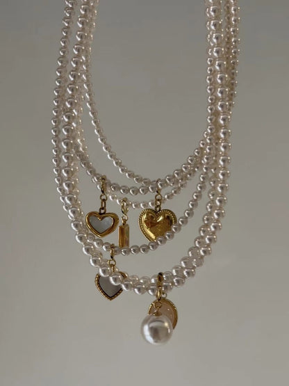 Natural Mother-of-Pearl Love Heart Titanium Steel Pendant with 14K Gold-Plated Clasp