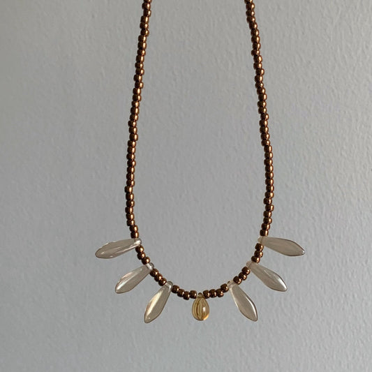 Vintage court-style necklace featuring Czech beads paired with natural stone transparent teardrop pendants.