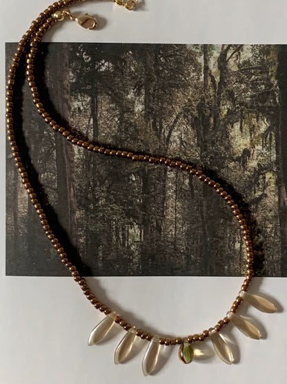 Vintage court-style necklace featuring Czech beads paired with natural stone transparent teardrop pendants.