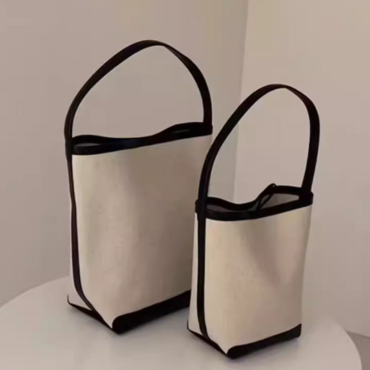 Women's 2024 new trend in handbags, trendy this year with a sense of luxury, black and white niche canvas tote bag, large capacity bucket crossbody bag