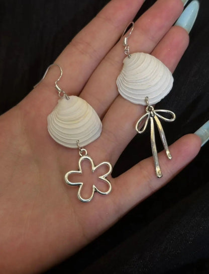 Handcrafted white shell earrings featuring floral and bow pendants, S925 silver，embodying a unique and niche style, a perfect gift for her.