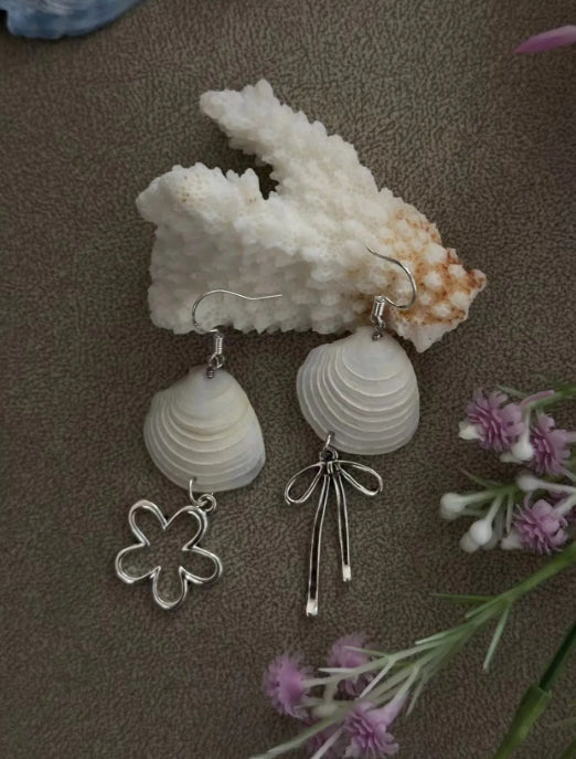 Handcrafted white shell earrings featuring floral and bow pendants, S925 silver，embodying a unique and niche style, a perfect gift for her.
