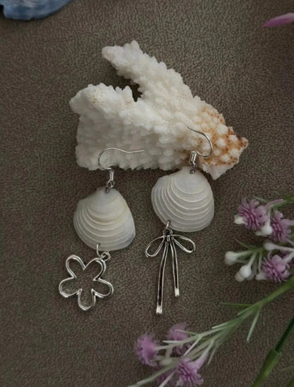Handcrafted white shell earrings featuring floral and bow pendants, S925 silver，embodying a unique and niche style, a perfect gift for her.