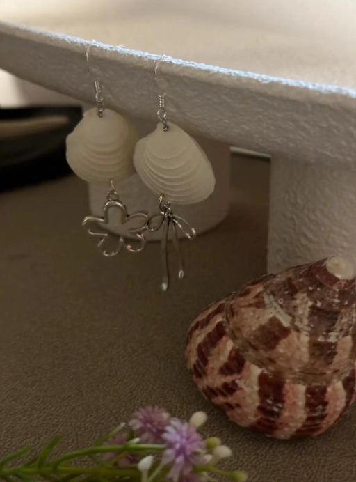 Handcrafted white shell earrings featuring floral and bow pendants, S925 silver，embodying a unique and niche style, a perfect gift for her.