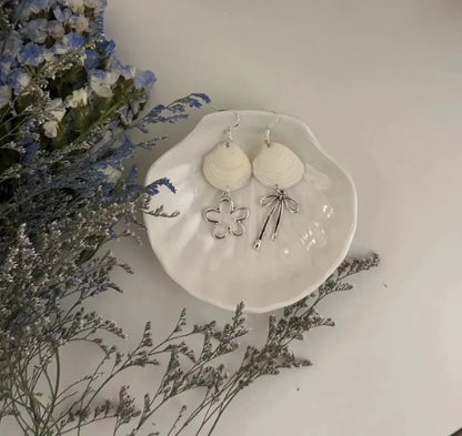Handcrafted white shell earrings featuring floral and bow pendants, S925 silver，embodying a unique and niche style, a perfect gift for her.