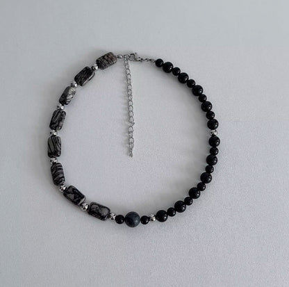 vintage-style black agate beaded choker, featuring a simple and elegant design. It's a perfect gift