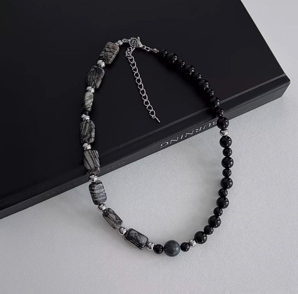 vintage-style black agate beaded choker, featuring a simple and elegant design. It's a perfect gift