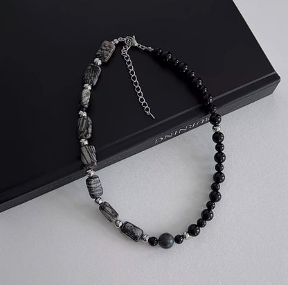 vintage-style black agate beaded choker, featuring a simple and elegant design. It's a perfect gift
