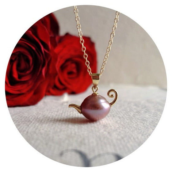 A French-style, vintage-inspired, naturally Baroque pearl teapot pendant necklace