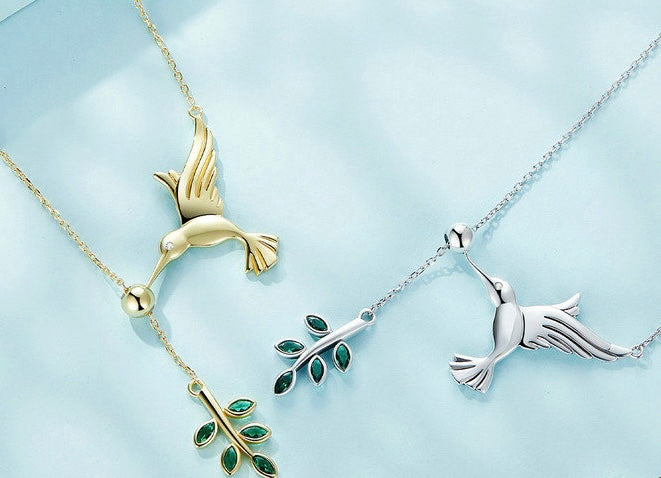 S925 Sterling Silver Hummingbird with Green Diamond Leaf Pendant Necklace, paired with matching ring, a uniquely perfect gift for women.