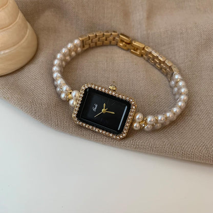 Pearl Strap Black Gold Watch: Square Dial for a Unique, Stylish Women's Timepiece with Sophisticated Appeal