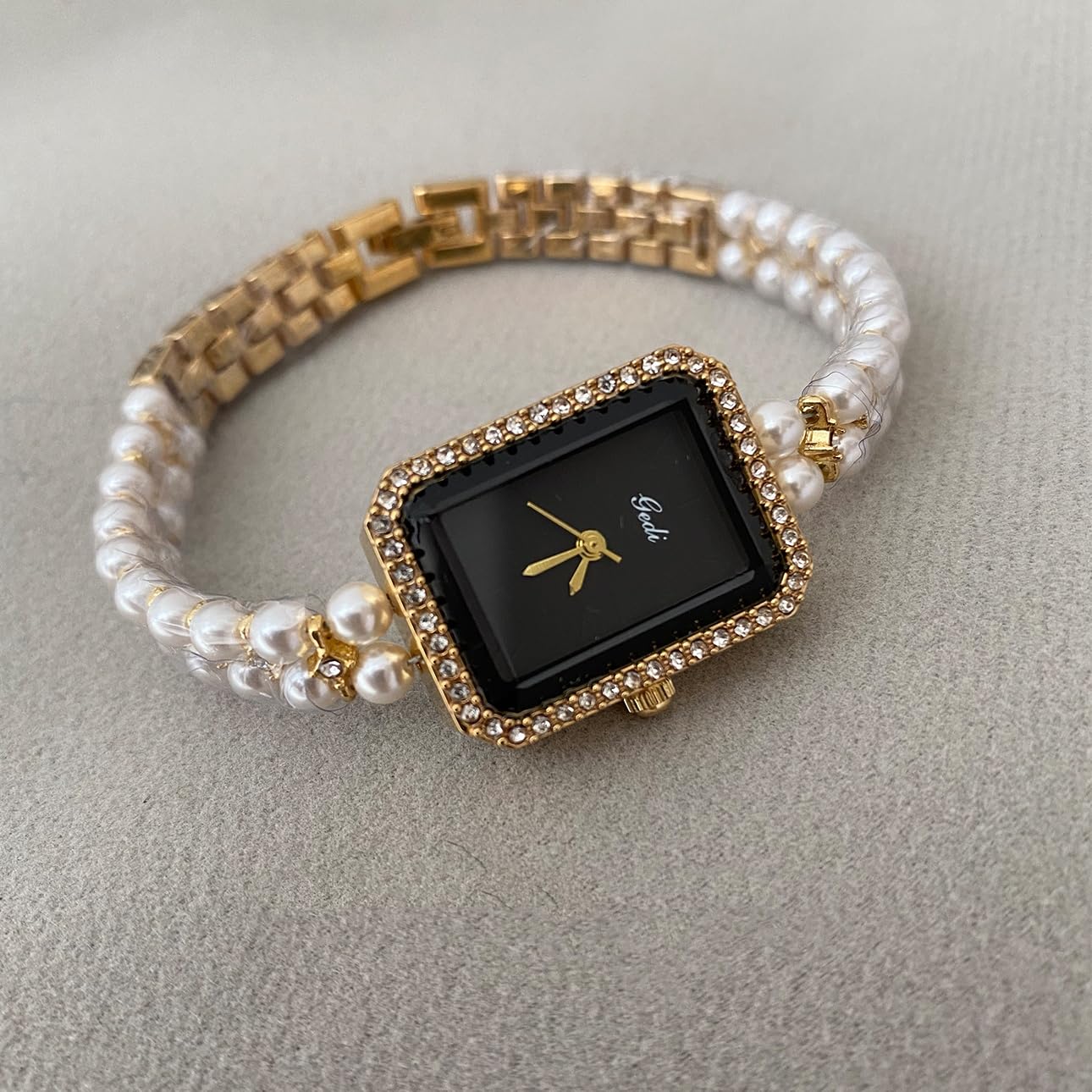 Pearl Strap Black Gold Watch: Square Dial for a Unique, Stylish Women's Timepiece with Sophisticated Appeal