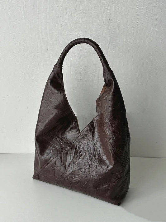 French Vintage Underarm Bag with High-Quality Feel: Featuring a Waxy Finish Leather with a Luxurious Texture, Spacious Capacity, and Minimalist White Style. Available in Black and Burgundy Colors. Perfect for Everyday Use