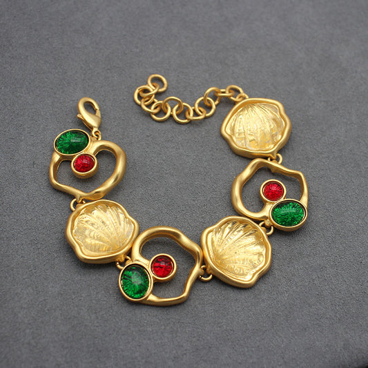 Handcrafted Jelly Glass-Look Gold-Plated Bracelet and Stud Earrings Set - Embossed Floral Design with Red & Green Gemstone Accents, Elegant Accessory for Day to Evening Glamour