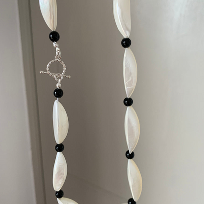 Crescent Moon White and Black Beaded Clavicle Chain Necklace with Statement Design